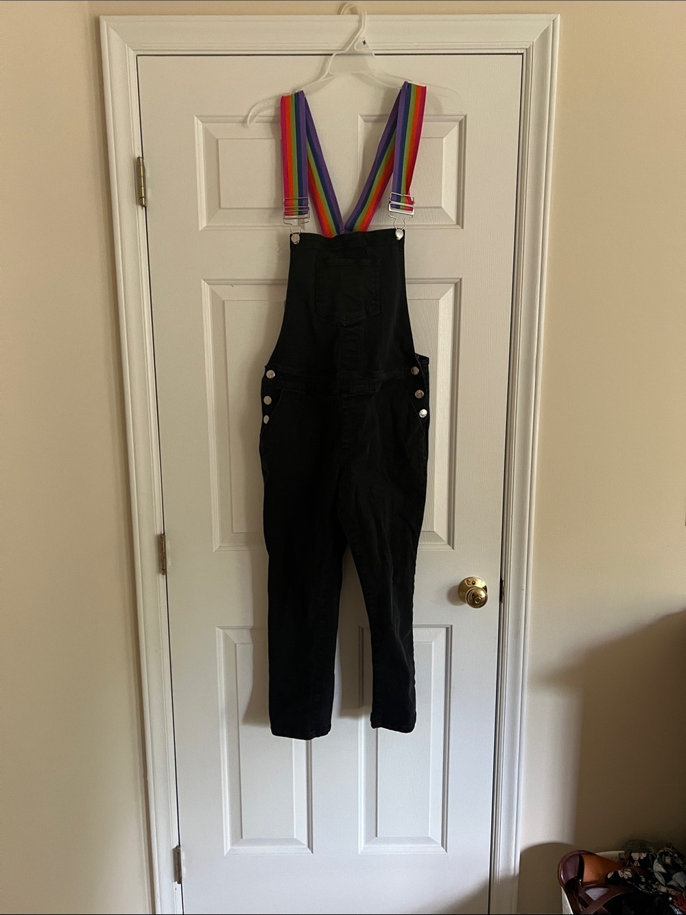 Delia’s black overalls